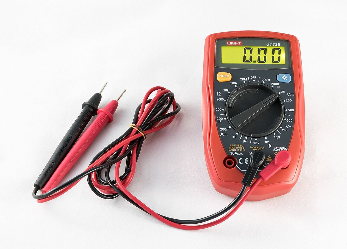 Digital multimeter with red and black test probes