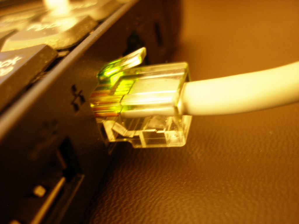 RJ45 Ethernet cable plugged into a network port