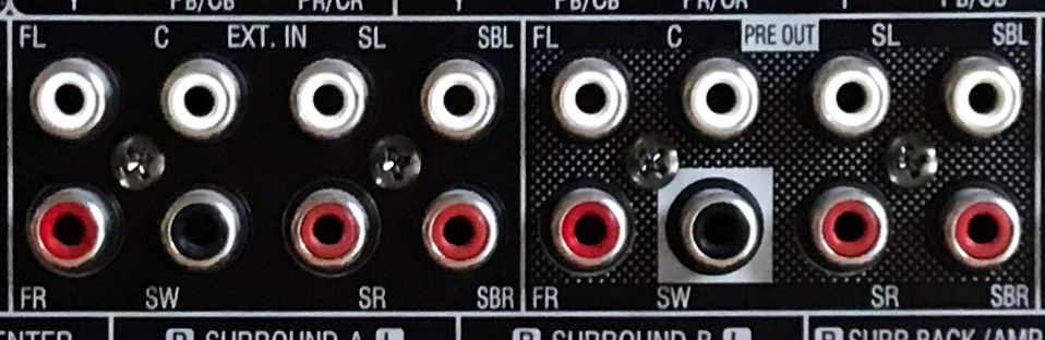 AV receiver rear panel with pre-outs including a black SW subwoofer output jack