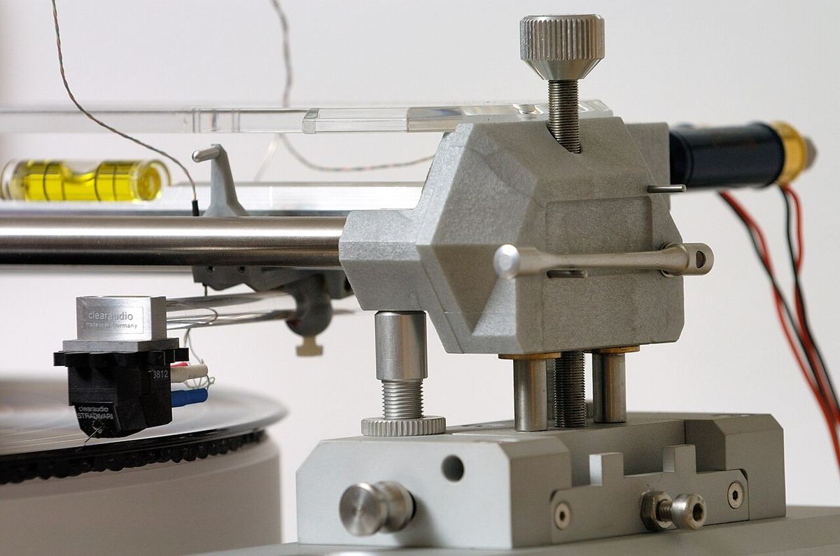 Clearaudio turntable with a linear-tracking tonearm on a rail above the platter