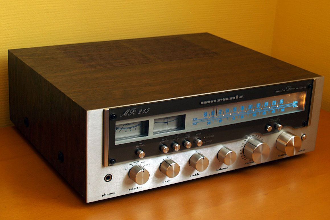 Vintage Marantz receiver with a silver front panel in a wooden case